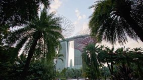 Singapore cityscape view of Marina Bay Sands. Beautiful garden in the center of the metropolis, travel and tourism in Asia. - Powered by Shutterstock - Get 15% off with code: PIKWIZARD15