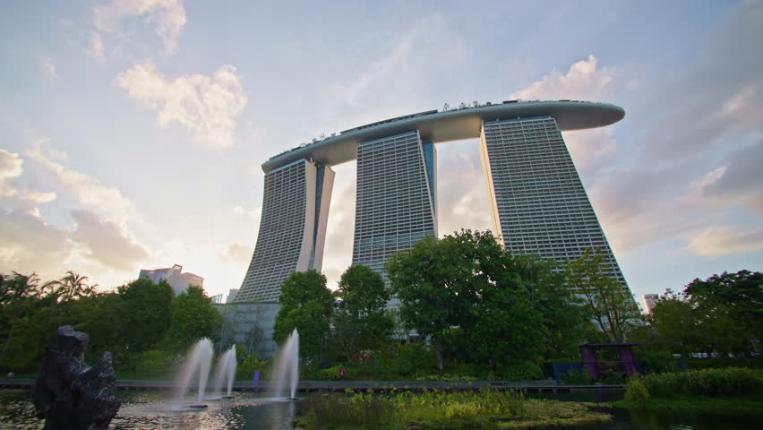 Singapore cityscape view of Marina Bay Sands. Fountains and ponds in the garden of the tourist location of the business capital of Asia.