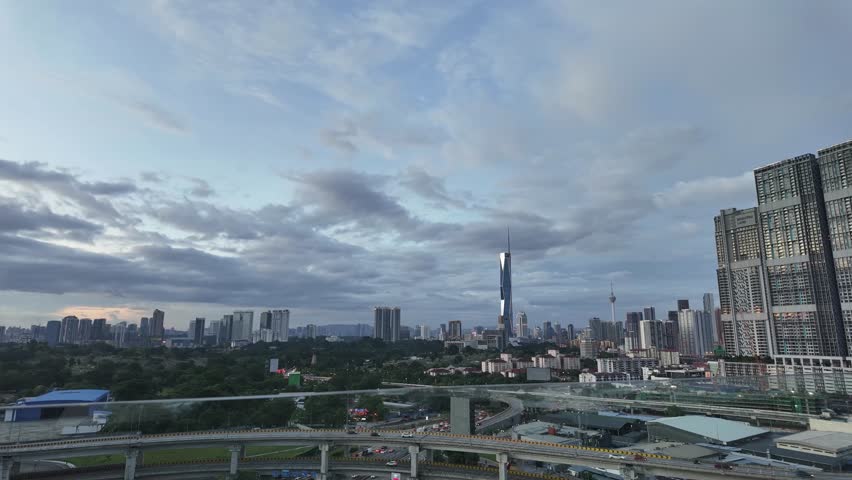 Panoramic cityscape of Kuala Lumpur Malaysia Merdeka 118 tower day to night timelapse