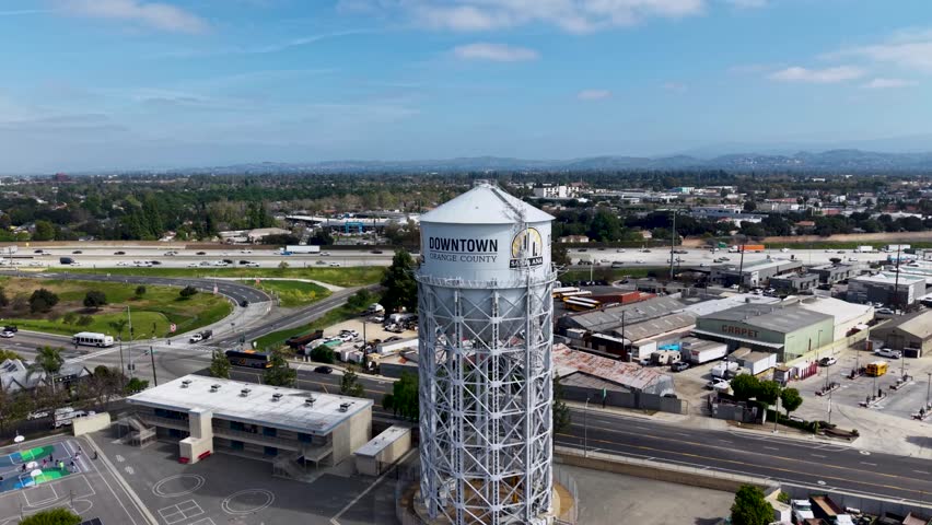 Sweeping aerial view of the Historical Orange County Water Tower. protected landmark built in 1935, holds 800,000 gallons of water