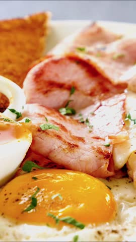 English breakfast with egg, bacon and bean