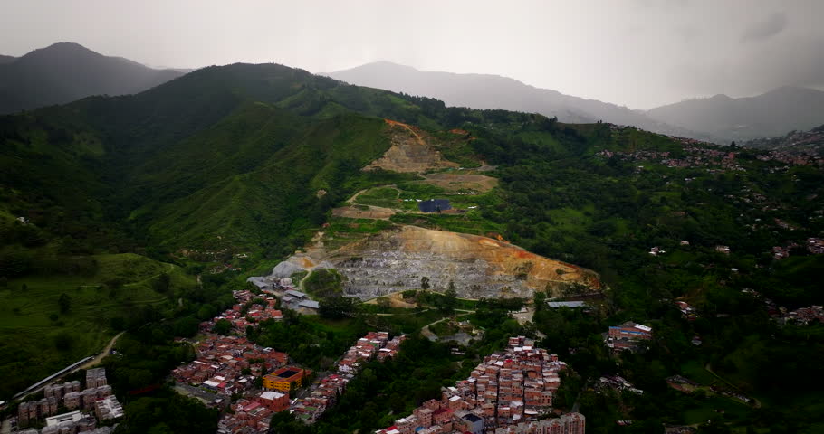 Drone of large urban mass grave of La Escombrera, The Dump. Medellin, Colombia.