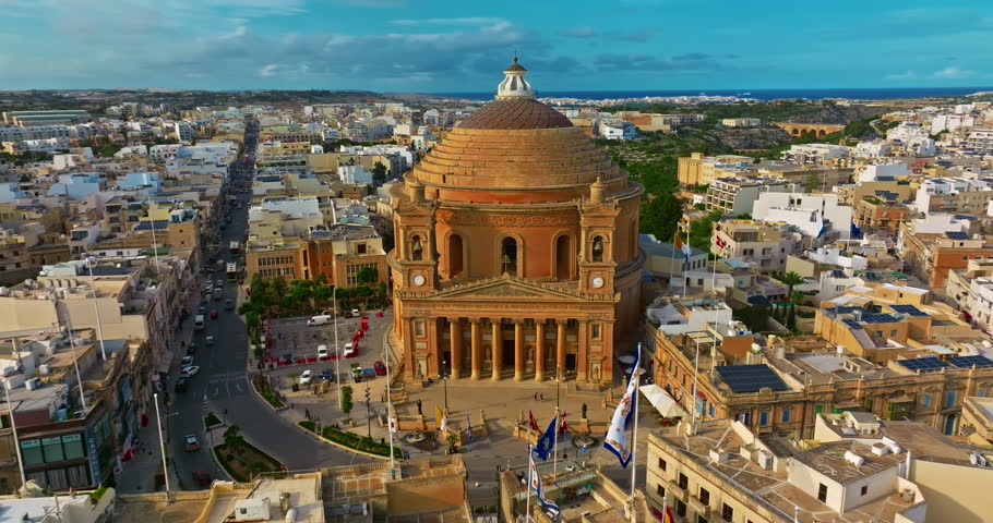 Aerial view of Mosta Church, famous remarkable wartime miracle, architectural landmarks, Malta 
