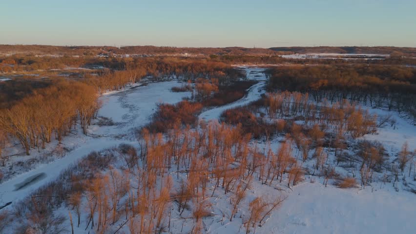 Aerial view of the Minnesota Valley at sunset during a warm winter