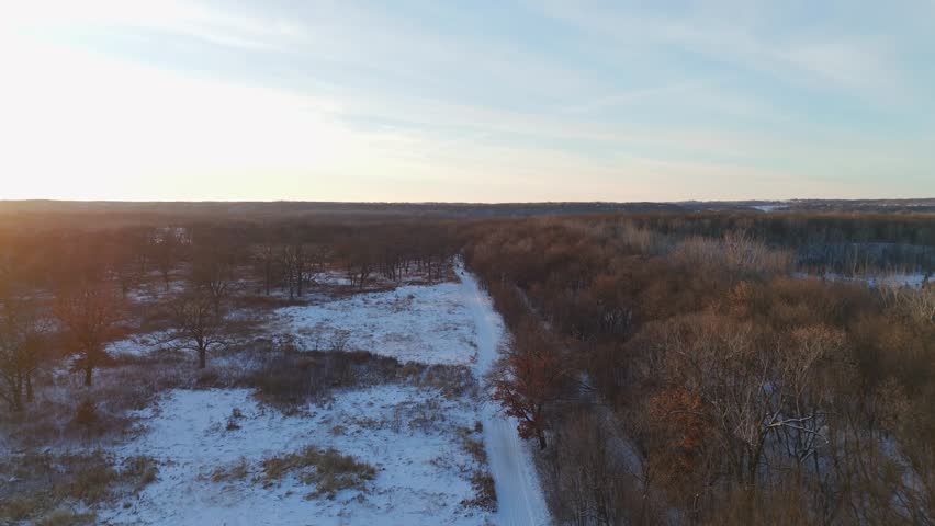Winter sunset aerial view over Minnesota Valley forest