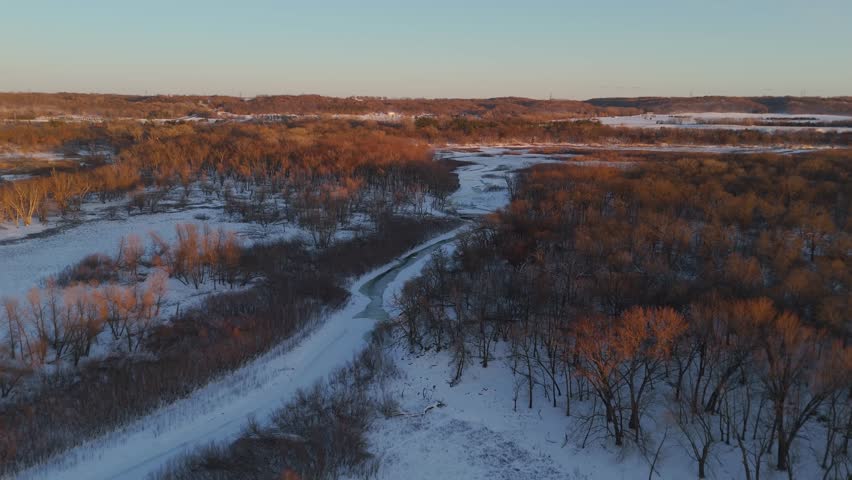 Drone perspective over the Minnesota Valley forest in winter