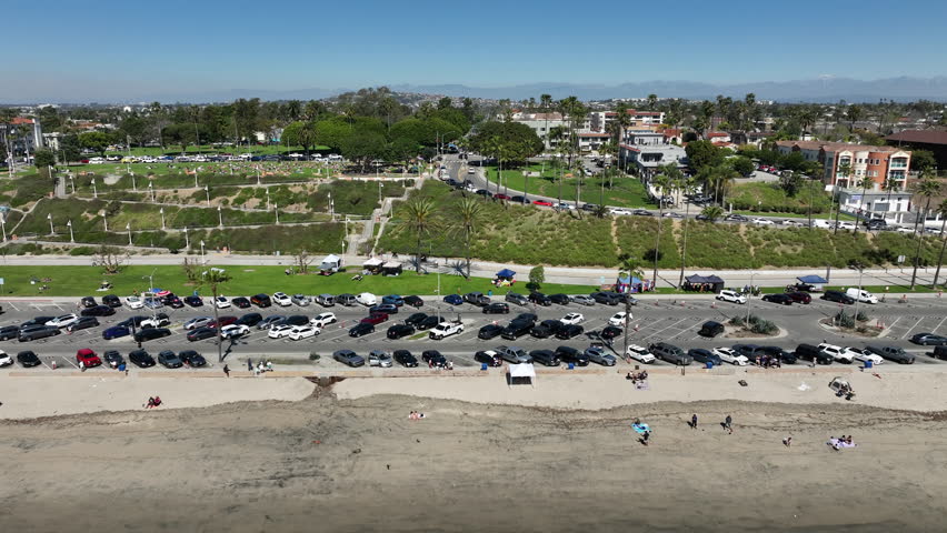 Long Beach, California, USA - Aerial View of Coast of Downtown Bluff Park Parking Lot With Cars and Basketball Court