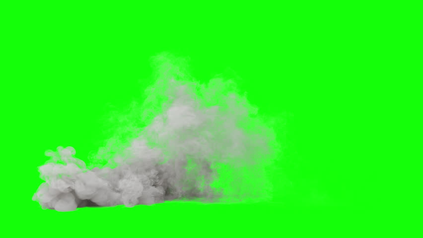 White smoke billowing on green screen. Realistic smoke effect isolated. Ground level white smoke.Dense white smoke spreading