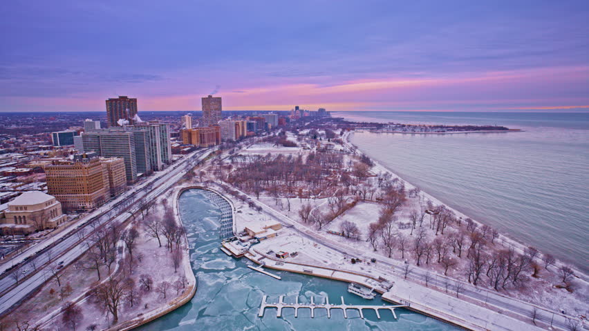 Cinematic drone flyover capturing the Loop at winter daybreak.