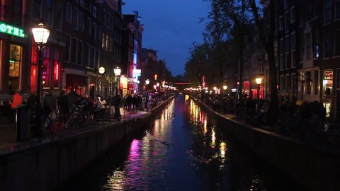 AMSTERDAM - MAY 11: Night view of the famous Red Light district in Amsterdam, Netherlands on May 11, 2013