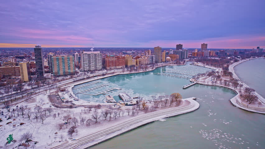 Aerial drone footage of the Loop at sunrise on a snowy winter morning.