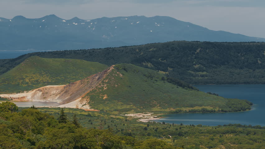 Mountains and tundra view with lakes near the Golovnin volcano on Kunashir island in Russia