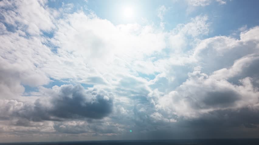 Aerial view of th sky with sun and clouds