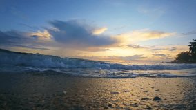 Ocean Waves Crashing on Sandy Beach at Sunset - Powered by Shutterstock - Get 15% off with code: PIKWIZARD15