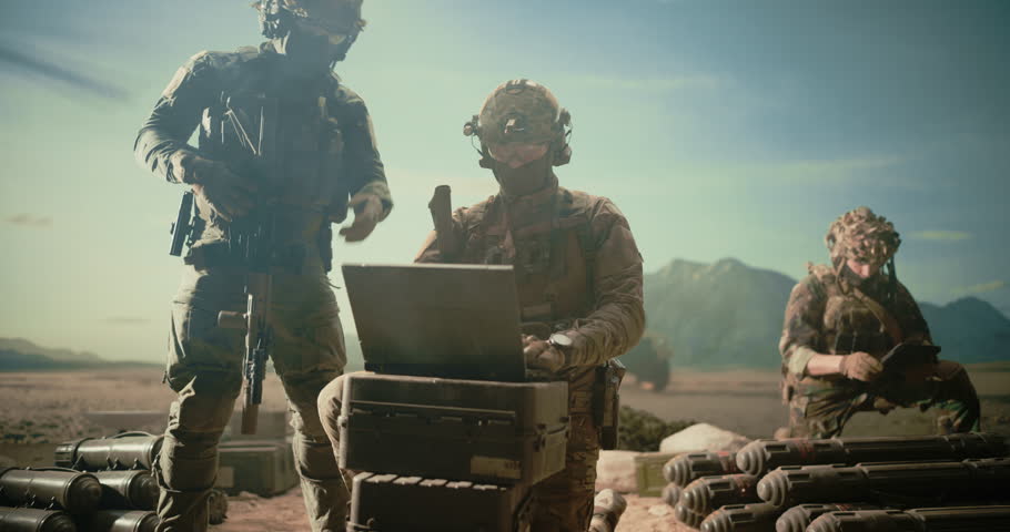 Special Forces Soldiers Conduct Military Operation, Using Battlefield Computers and Surveillance Systems to Track Targets, Coordinate Reconnaissance, Manage Precision Strike in Desert, Modern Warfare