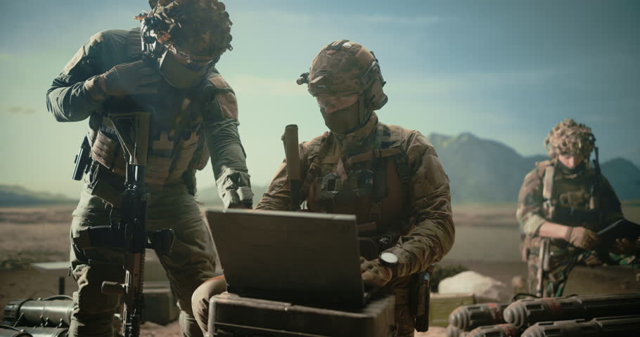 Special Forces Soldiers Conduct Military Operation, Using Battlefield Computers and Surveillance Systems to Track Targets, Coordinate Reconnaissance, Manage Precision Strike in Desert, Modern Warfare 