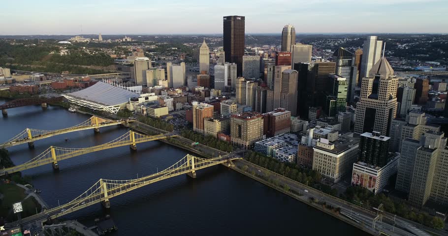Aerial view of Pittsburgh, Pennsylvania. Daytime with business district and river with three bridges in background