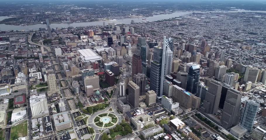 Philadelphia Cityscape Skyscrapers and Delaware River Ben Franklin Bridge City Hall Logan Circle Park in Background. 4k