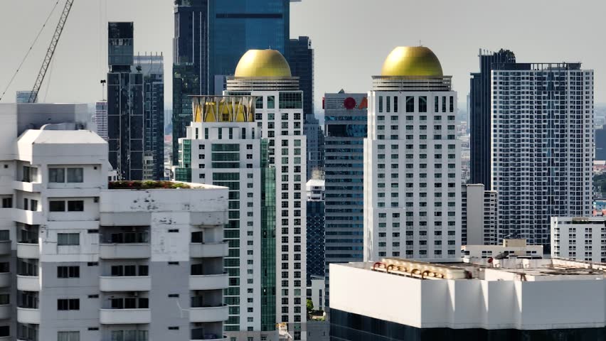 Modern towers and residential buildings in Bangkok, Thailand.