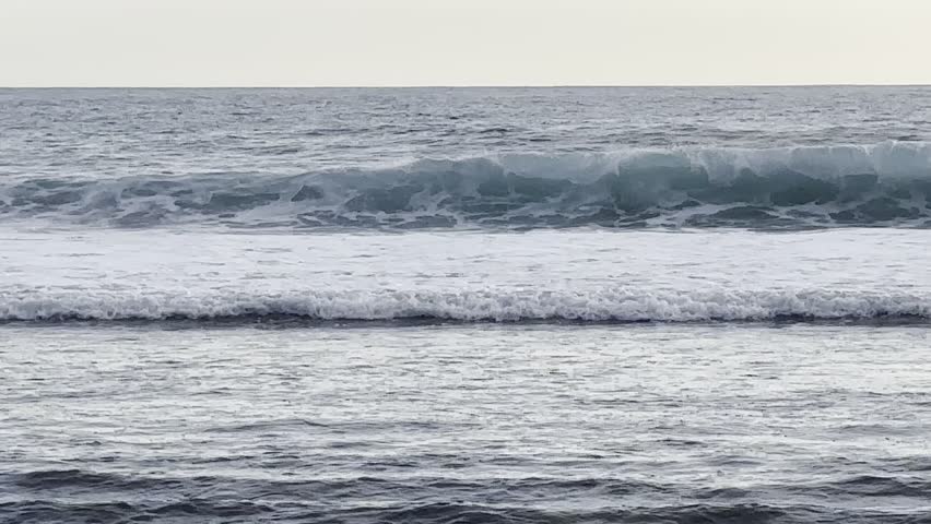 waves on a beautiful white sand beach