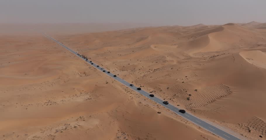 Aerial footage of offroad cars running in the desert