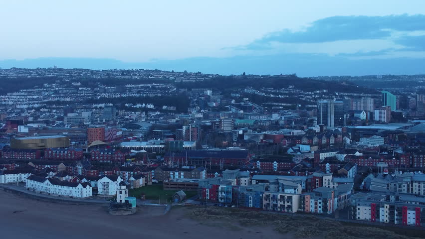 First Light View of Swansea City with Historic Observatory on Beach Front and Buildings with Houses on Hills. 2nd Largest City in Wales, UK.