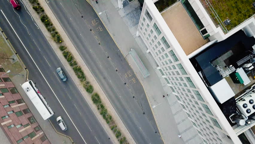 Overhead drone shot of Sunderland City Hall roof and main road traffic at sunset