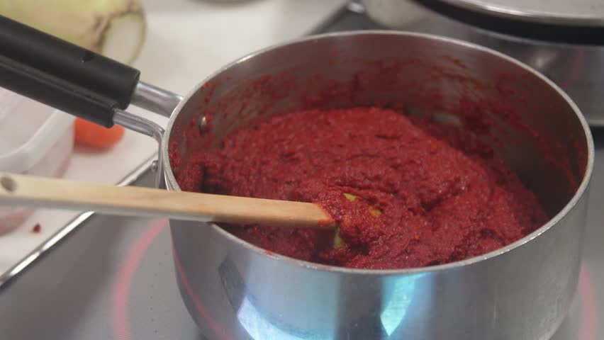 Image of a woman making kimchi