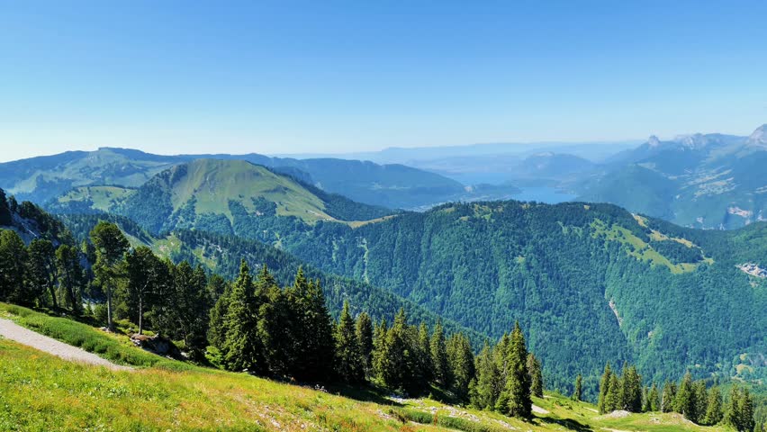 mountain landscape with green forest and blue sky
