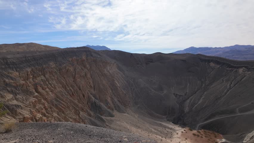 Gimbal wide panning shot from the base of Ubehebe Crater in Death Valley, California. 4K