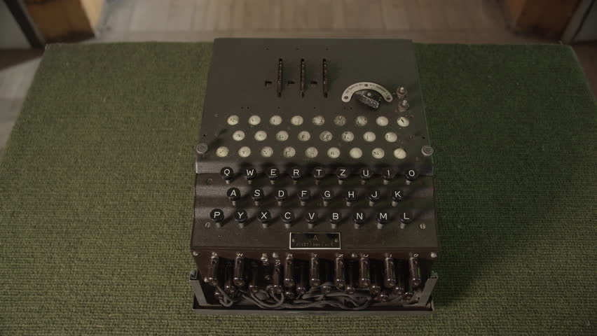 Enigma cipher device. Retro machine device attached to a typewriter