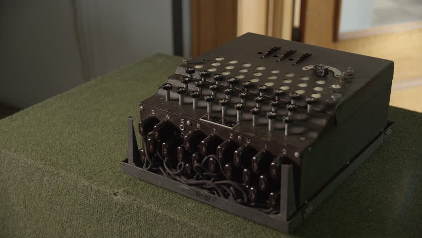 Enigma cipher device. Retro machine device attached to a typewriter