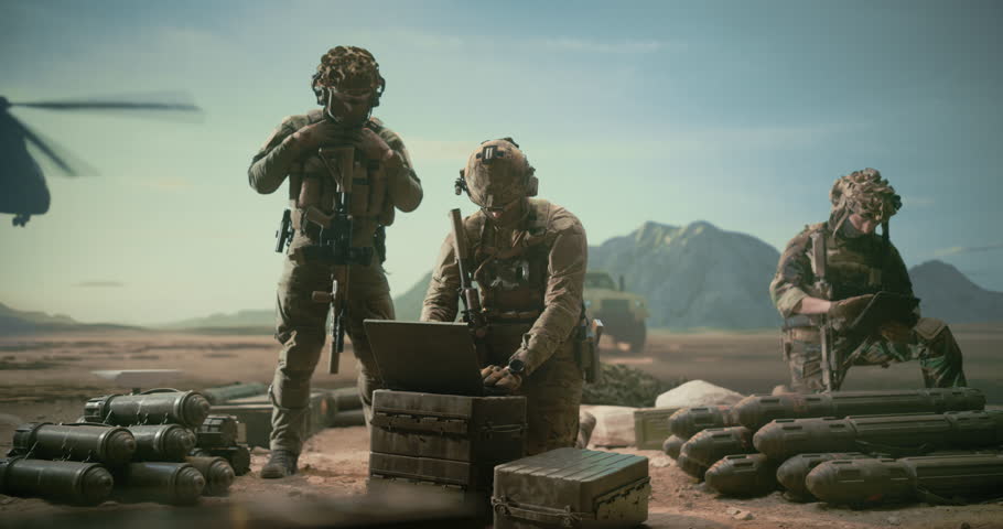 Special Forces Soldiers Conduct Military Operation, Using Battlefield Computers and Surveillance Systems to Track Targets, Coordinate Reconnaissance, Manage Precision Strike in Desert, Modern Warfare
