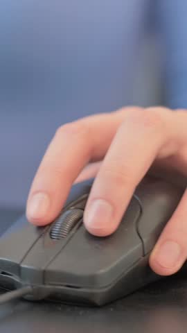 Close up of Woman Using Computer Mouse, vertical video