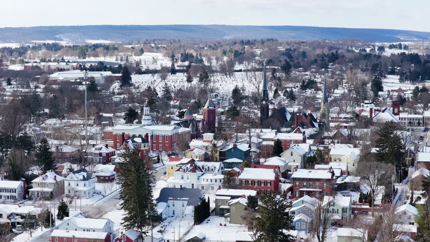 Downtown Lewisburg on a overcast day with Snow dusting from an aerial drone shot.