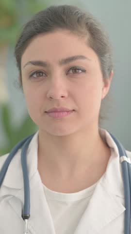 Portrait of Woman Shaking Head in Approval, vertical