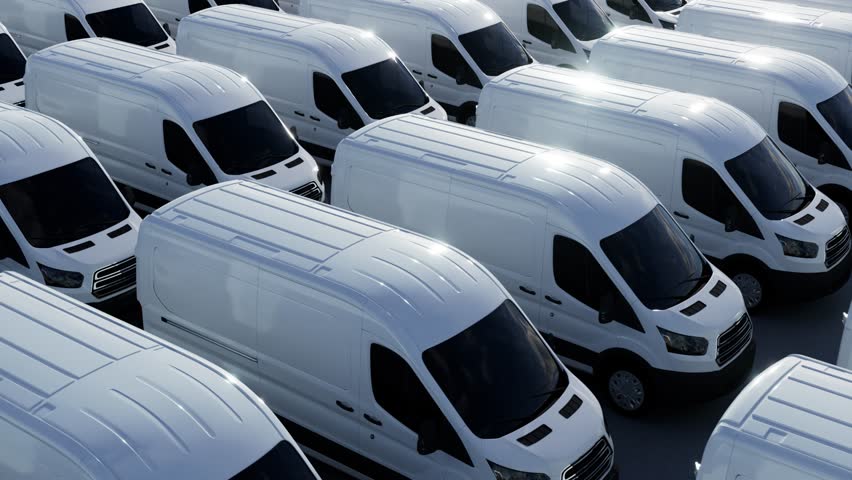 Van on factory parking lot	