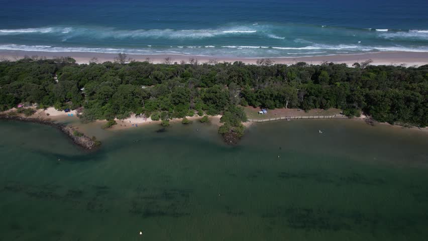 Mooball Creek With Lush Tree In Pottsville, New South Wales, Australia. Aerial Shot