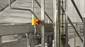 Industrial emergency red stop button on factory machine column, close up - Powered by Shutterstock - Get 15% off with code: PIKWIZARD15