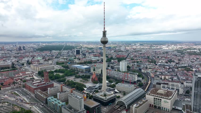 City of Berlin, Germany from above.Aerial view of cityscape showing architectural landmarks Fernsehturm TV Tower and Berlin Cathedral by day. Drone Flight over Alexanderplatz TV Tower, Sunflairs circa