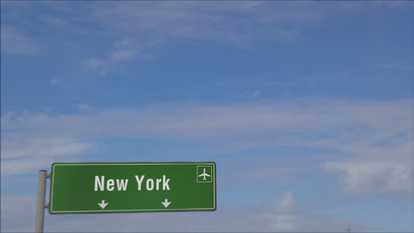 New York airplane landing. Jet plane travel to USA, United States arrival with airport signboard.