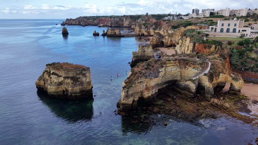 Algarve Portugal Lagos coast rock formations paddleboarding