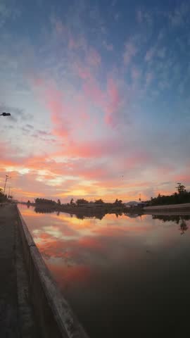 Sunset Over Water Reflection. Canal