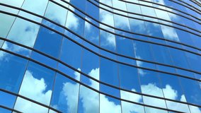 This video captures the exterior glass facade of a modern high-rise building. The visual documents the curtain wall system and the reflection of blue sky and clouds on the non-structural glass panels. The composition illustrates urban architectural design and aluminum framing, documenting corporate infrastructure in a high-resolution 4K format for architectural, business, and editorial media. - Powered by Shutterstock - Get 15% off with code: PIKWIZARD15