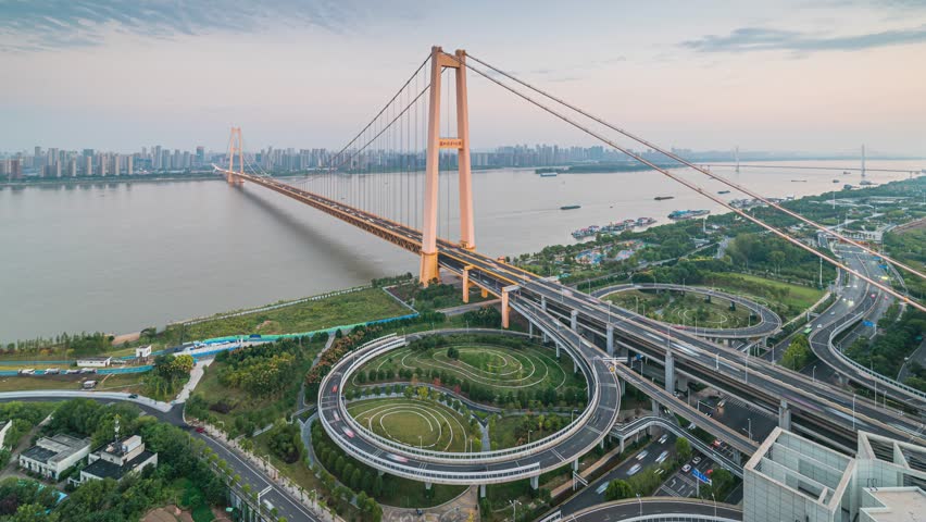Day to Night Time-lapse of Traffic on Wuhan Yangsigang Yangtze River Bridge