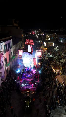 Vertical view of a mechanical float at Viareggio Carnival night