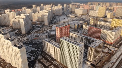 Smooth Backward Aerial over Apartment Complex