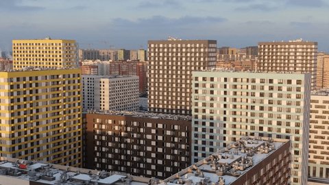 Drone Lowering Front Urban Housing Complex