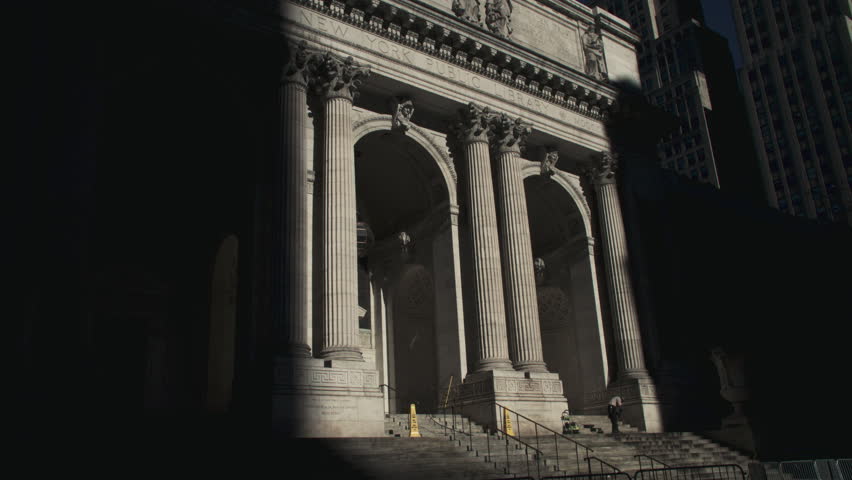 Handheld shot of the New York Public Library at sunrise. Shot in Midtown Manhattan.