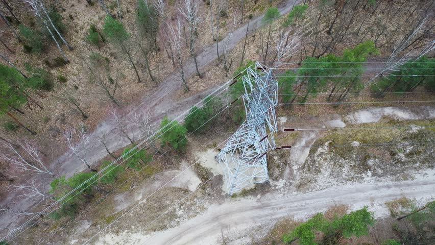 Transmission tower in forest in Bialoleka district on the edge of Warsaw city, Poland